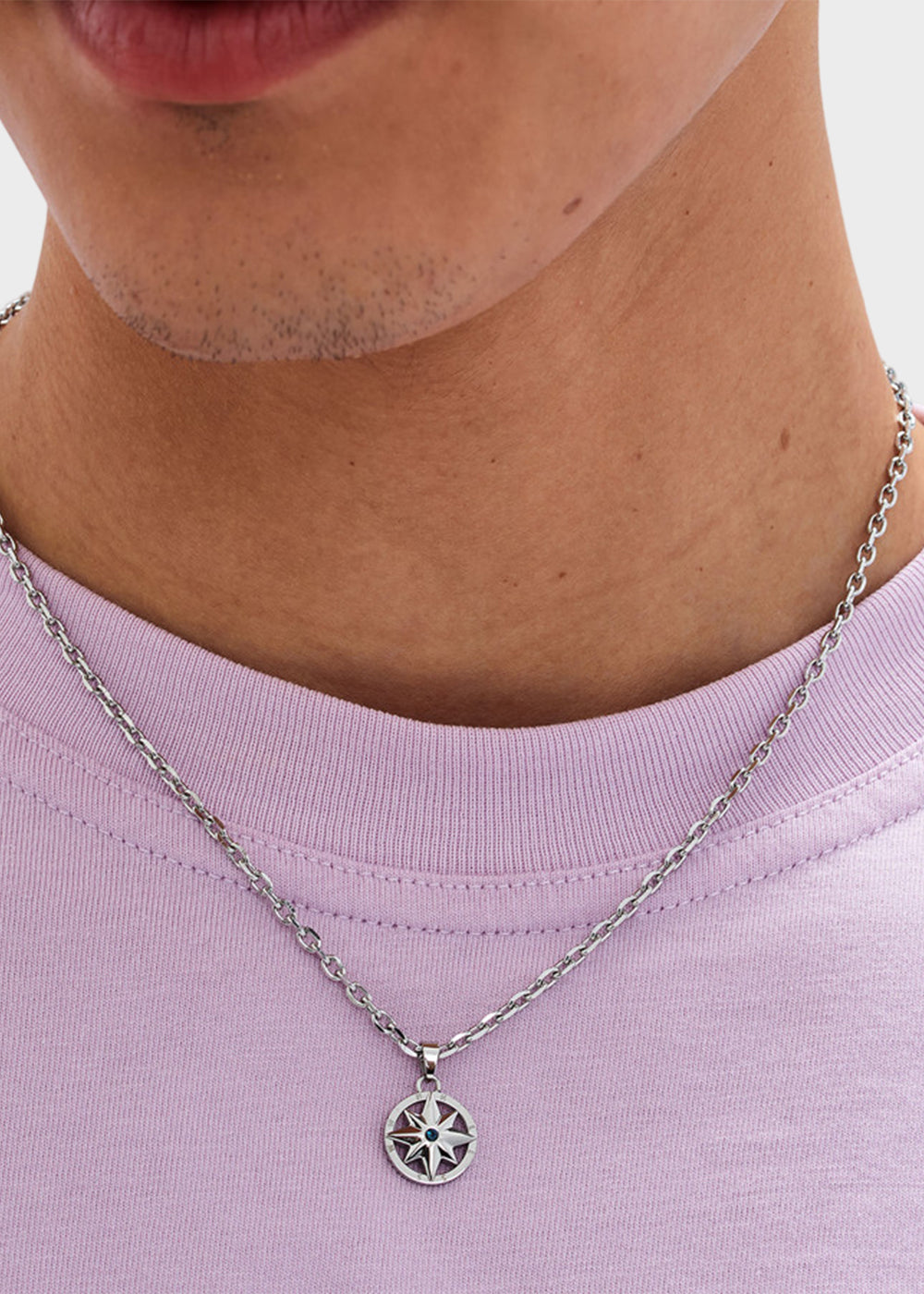 Collana Nautika in acciaio con pendente rosa dei venti e zircone blu