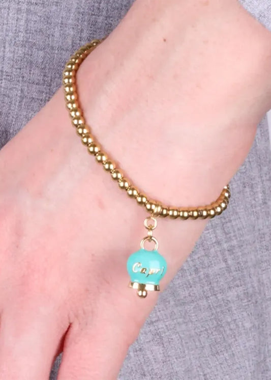Bracciale in Acciaio con campanella pendente verde con scritta Capri