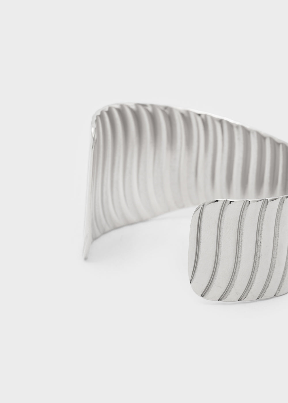 Bracciale Iris rigido rigato in acciaio inossidabile
