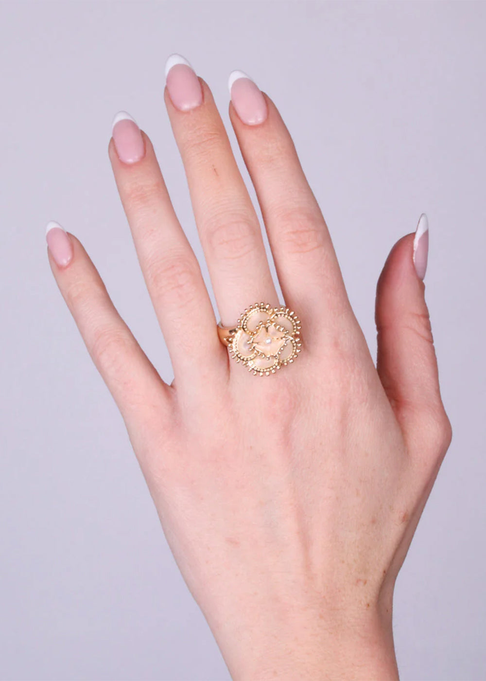 Gold-plated metal ring with flower