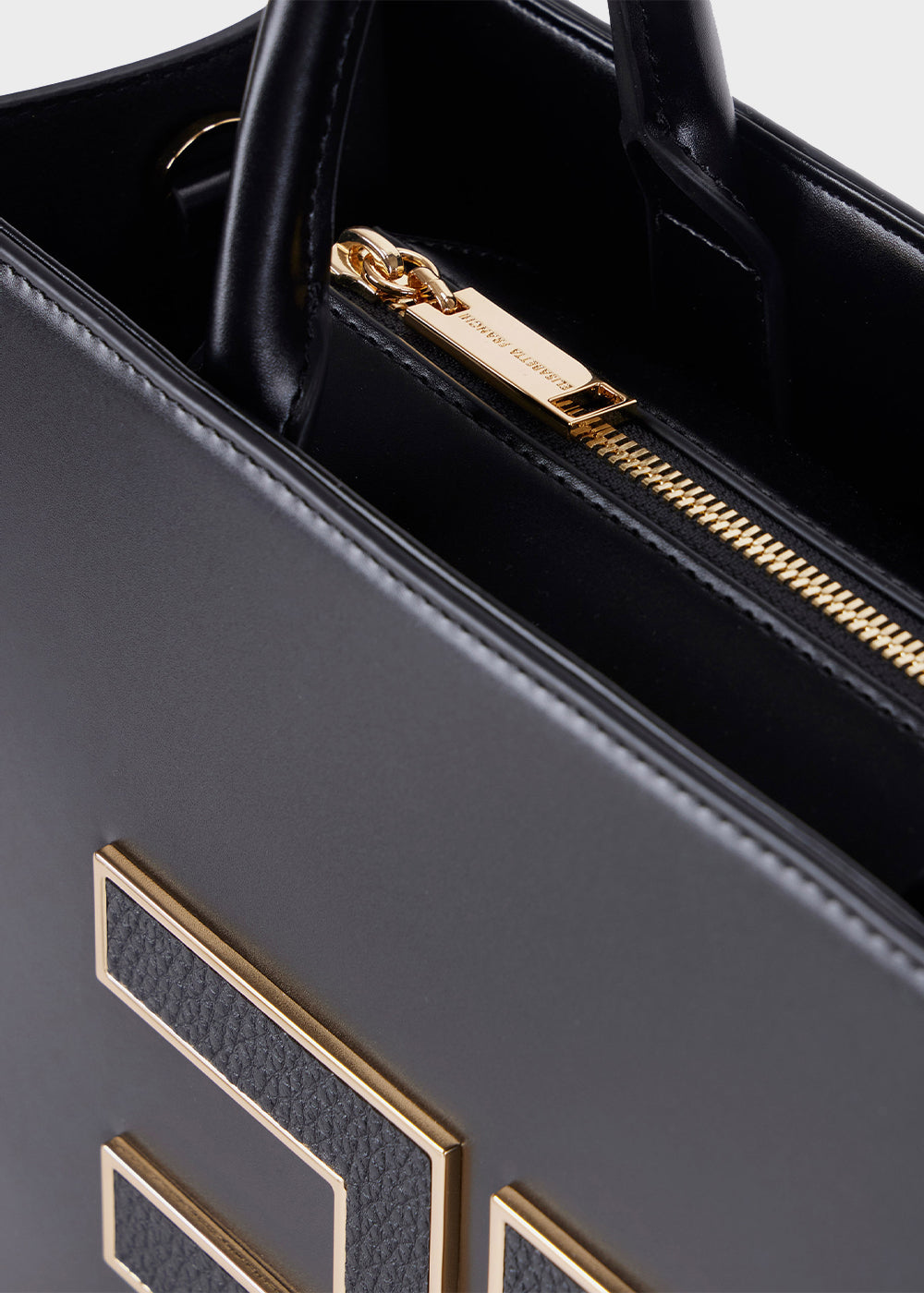 Large handbag with shoulder strap and logo