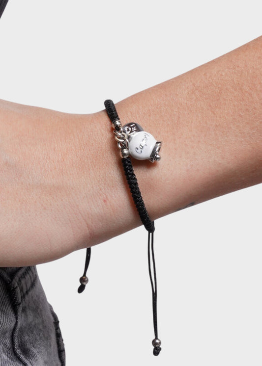 Bracciale in tessuto Nero e Acciaio con Campanella Portafortuna Bianca