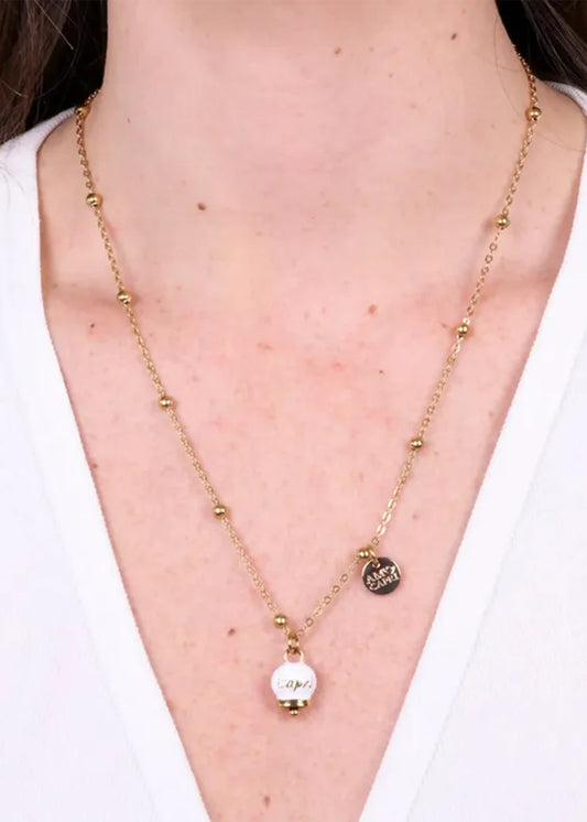 Collana in Acciaio con campanella pendente bianca e oro con scritta Capri