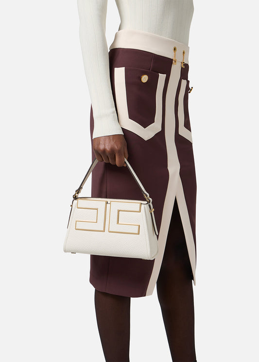 Handbag with shoulder strap and logo