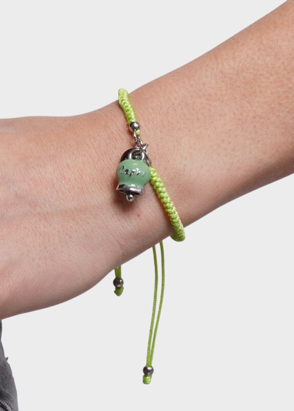 Bracciale in tessuto e Acciaio con Campanella Portafortuna Verde