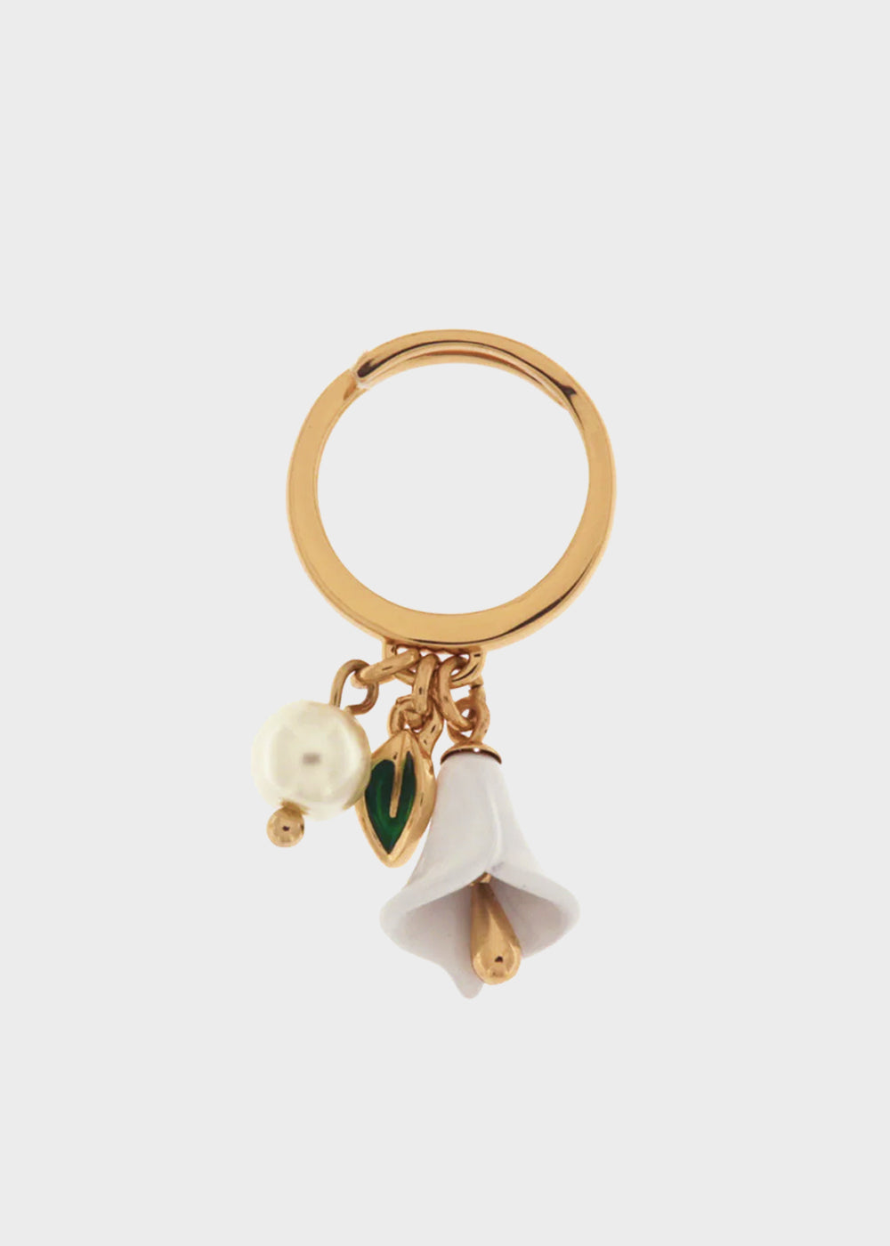 Gold-colored metal ring with pearl and white calla lily-shaped bell