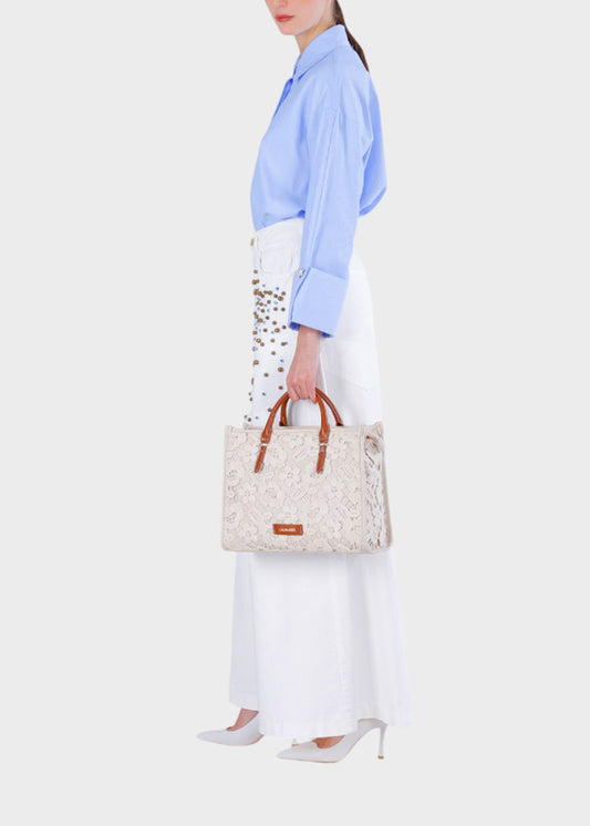 Borsa a mano con tracolla e decorazioni in tessuto
