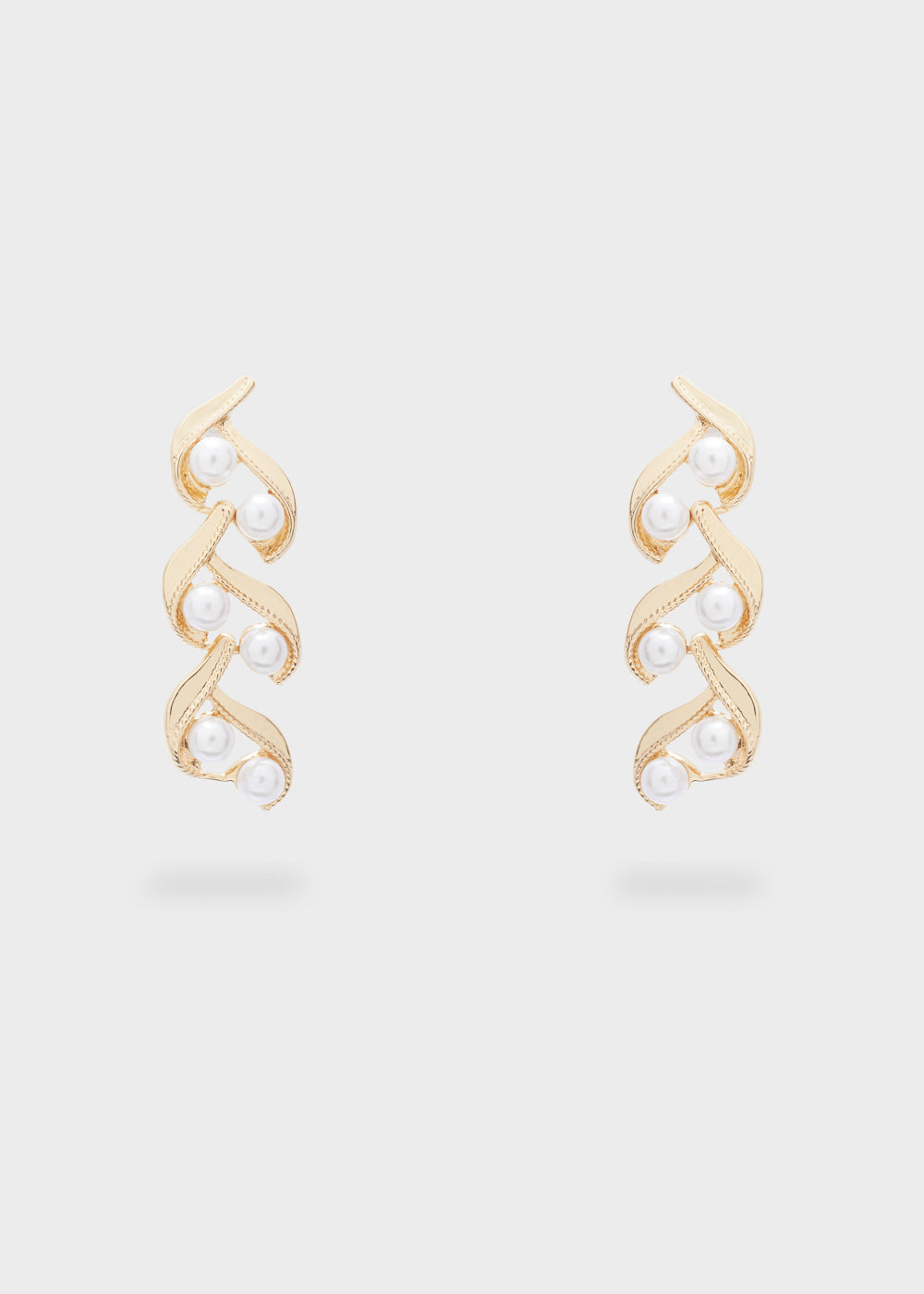 BRAIDED GOLD EARRINGS WITH WHITE STONES