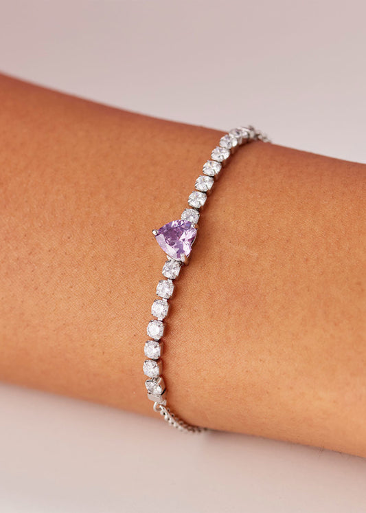 Bracciale Dazzly in acciaio con zirconi chiari e zircone centrale a forma di cuore viola