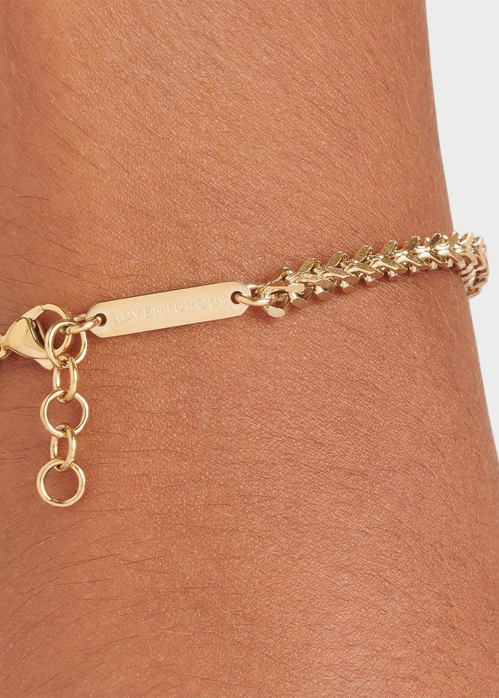 Bracciale catena Ripple a spiga quadrata in acciaio 316, finitura pvd oro 14K e barretta con incisione