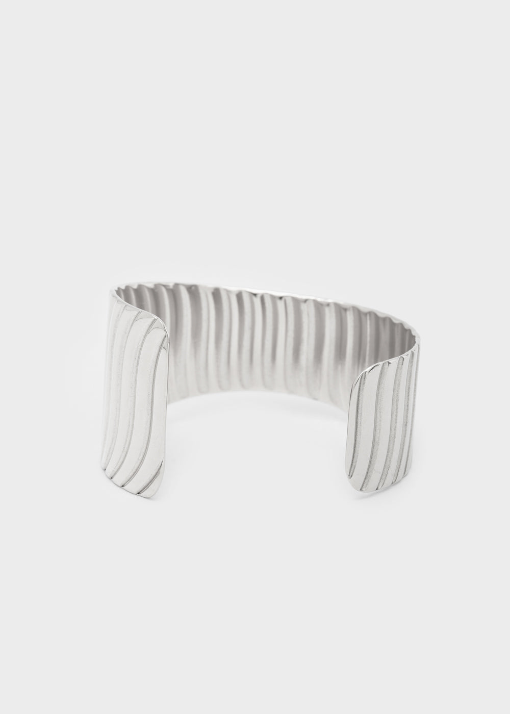 Rigid Iris bracelet in striped stainless steel