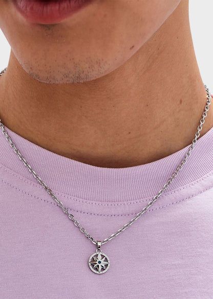 Collana Nautika in acciaio con pendente rosa dei venti e zircone blu