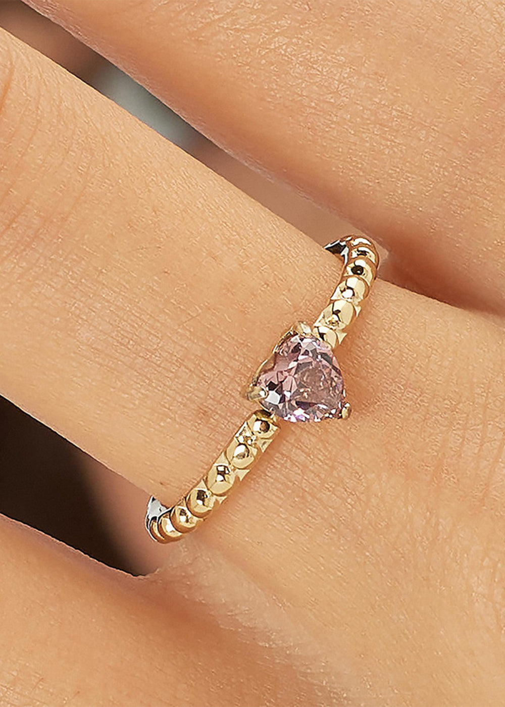 Anello regolabile Dazzly in acciaio con finitura pvd oro 14k e pietra a forma di cuore rosa