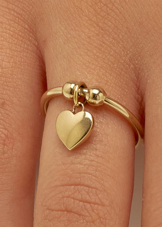 Anello regolabile Feelings in acciaio con finitura pvd oro 14K e sfere e pendente a forma di cuore