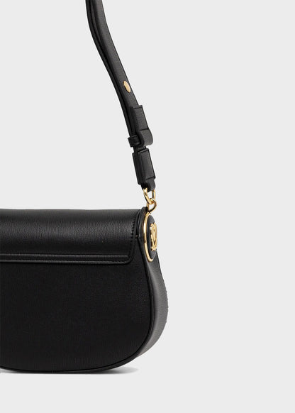 Shoulder bag with flap and logo