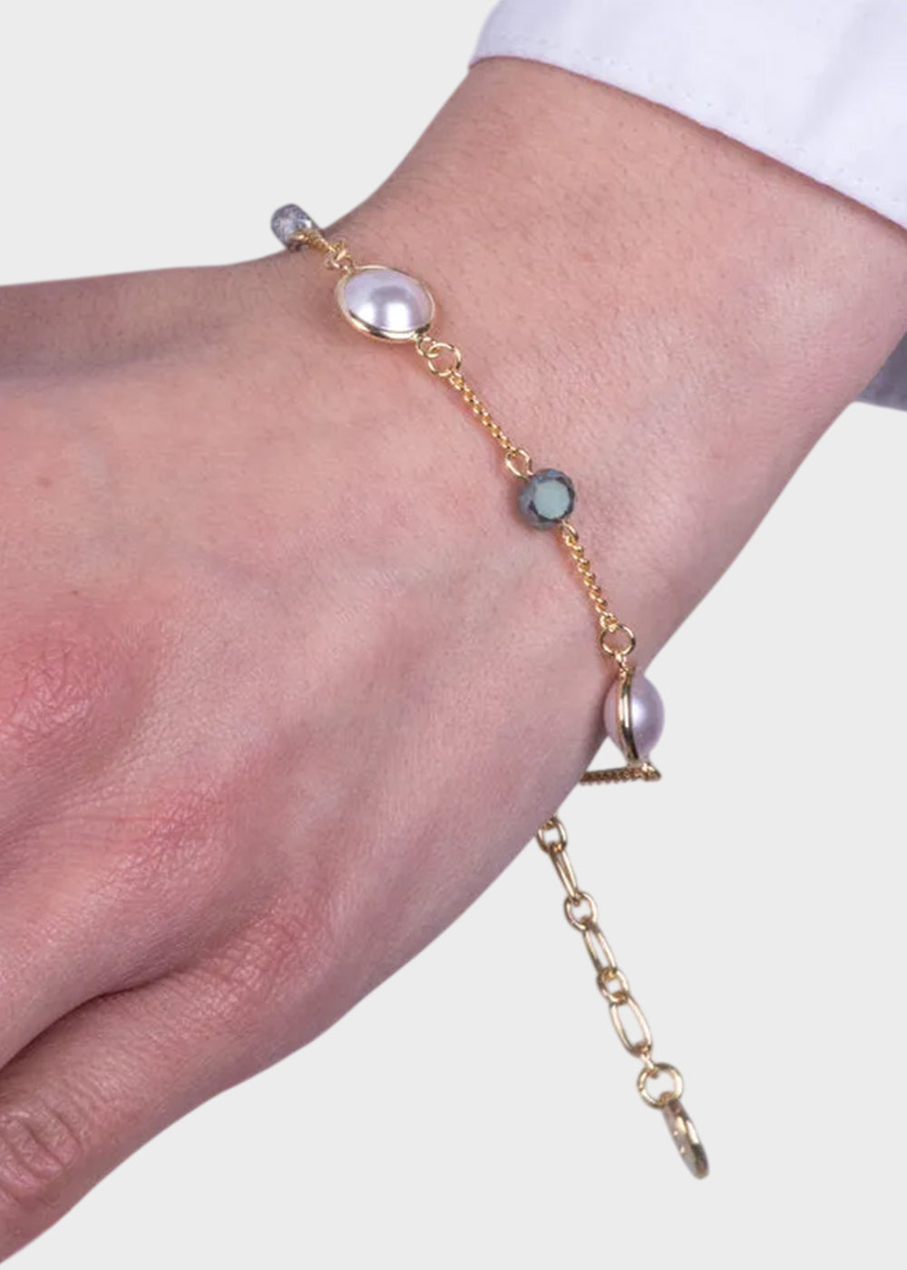Bracciale in Metallo color oro con perline blu