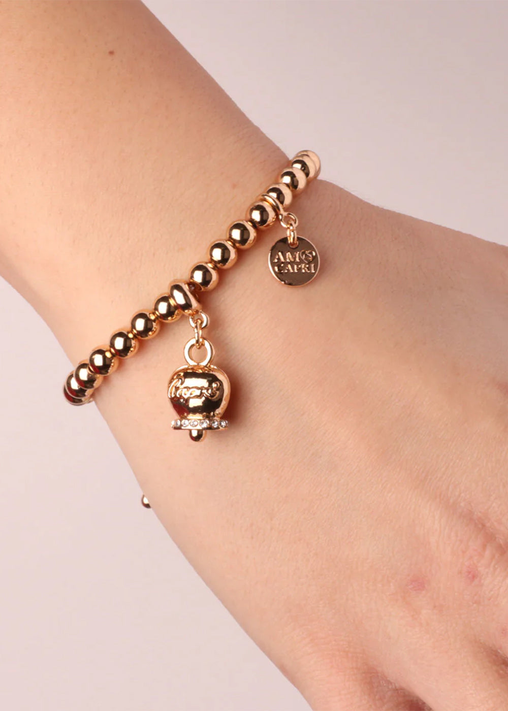 Bracciale in Metallo color oro con maglia a sfere e campanella Capri