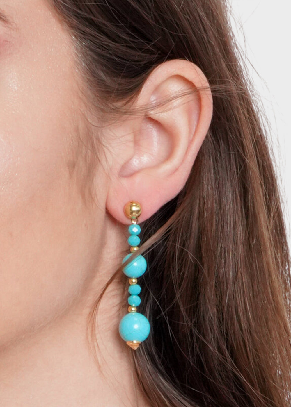 Orecchini pendenti in Metallo color oro con perline tonde azzurre