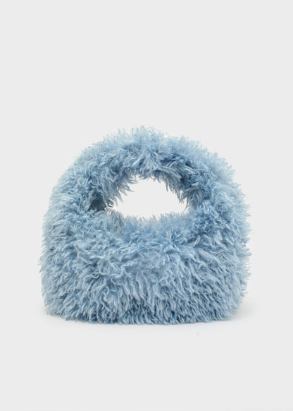 Borsa a mano Furry con tracolla e peli sintetici azzurri