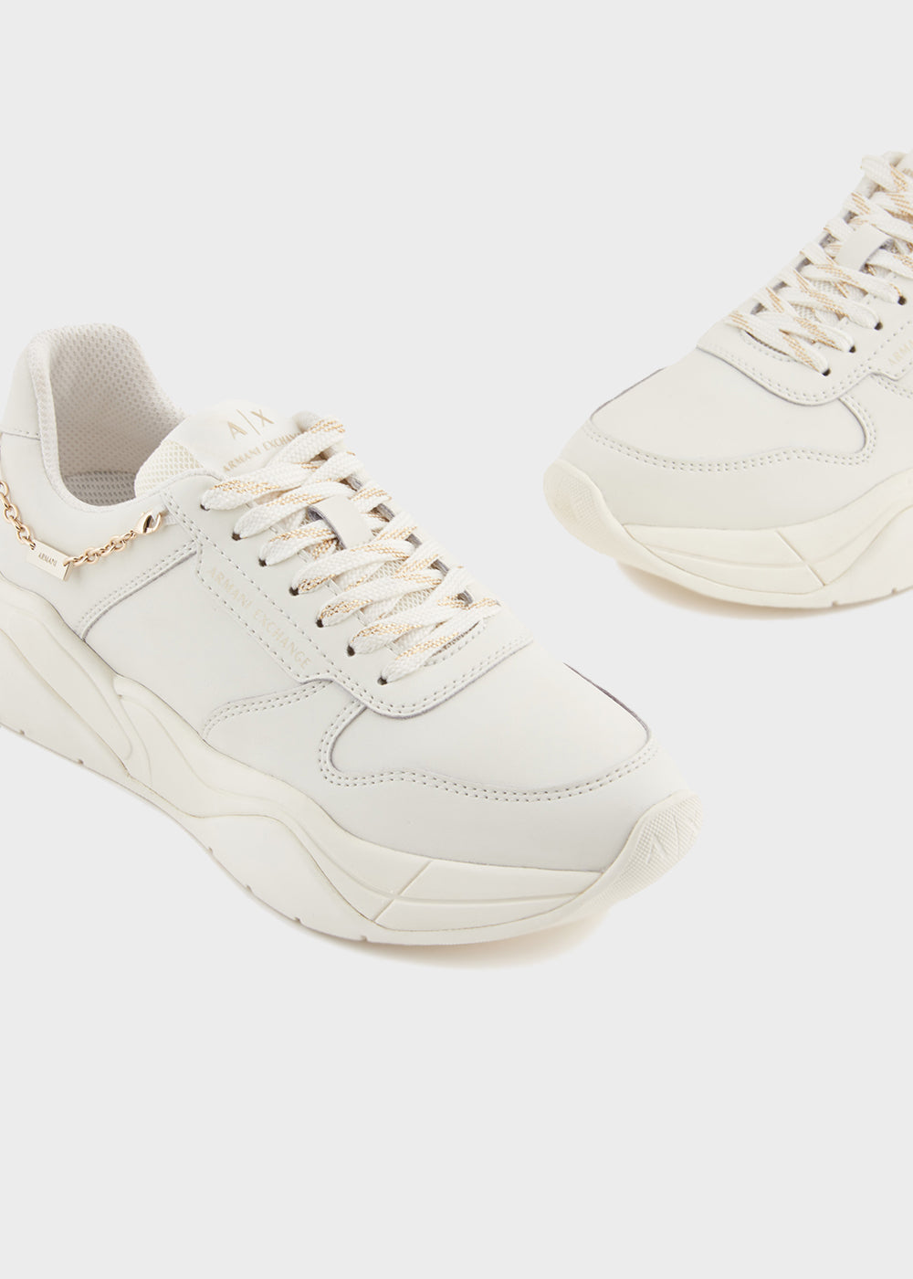 Sneakers con ciondolo