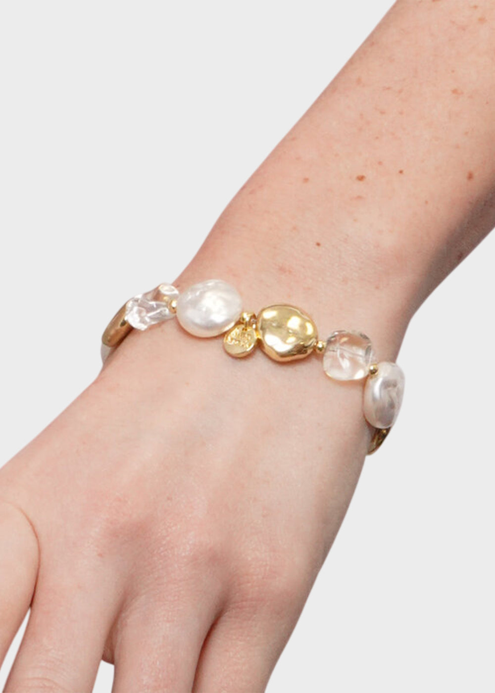 Bracciale elastico in Metallo color oro con pietre e perle schiacciate