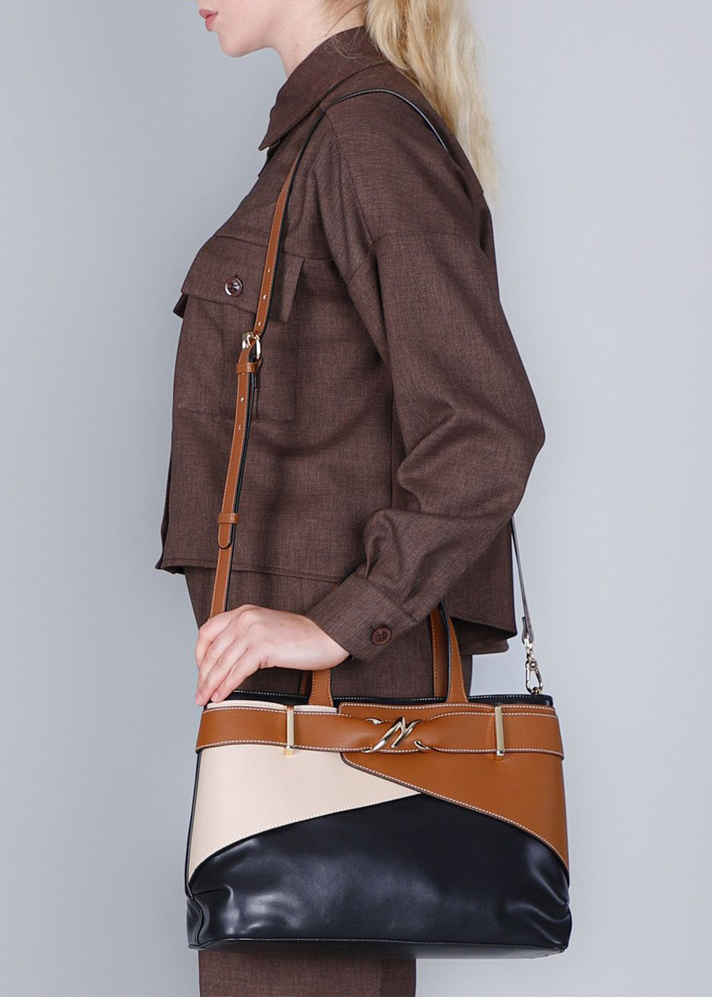 Handbag with shoulder strap and metal detail