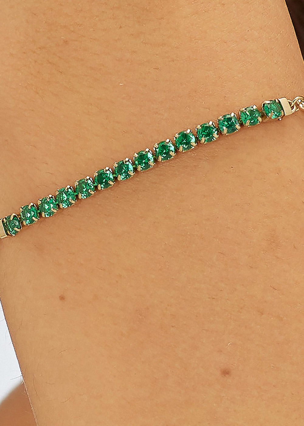 Bracciale Dazzly in acciaio con finitura pvd oro 14K e centrale tennis e cubic zirconia verde