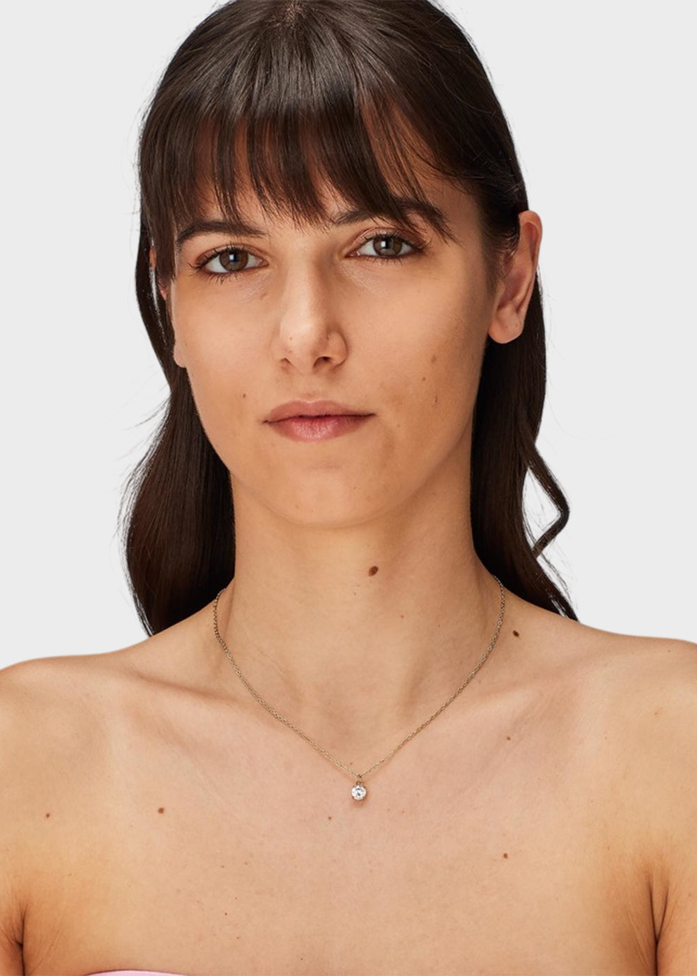 Collana Dazzly girocollo in acciaio con finitura pvd oro 14K e pendente centrale con pietra