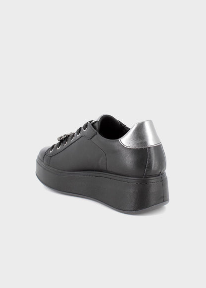 Scarpe con zeppa e lacci