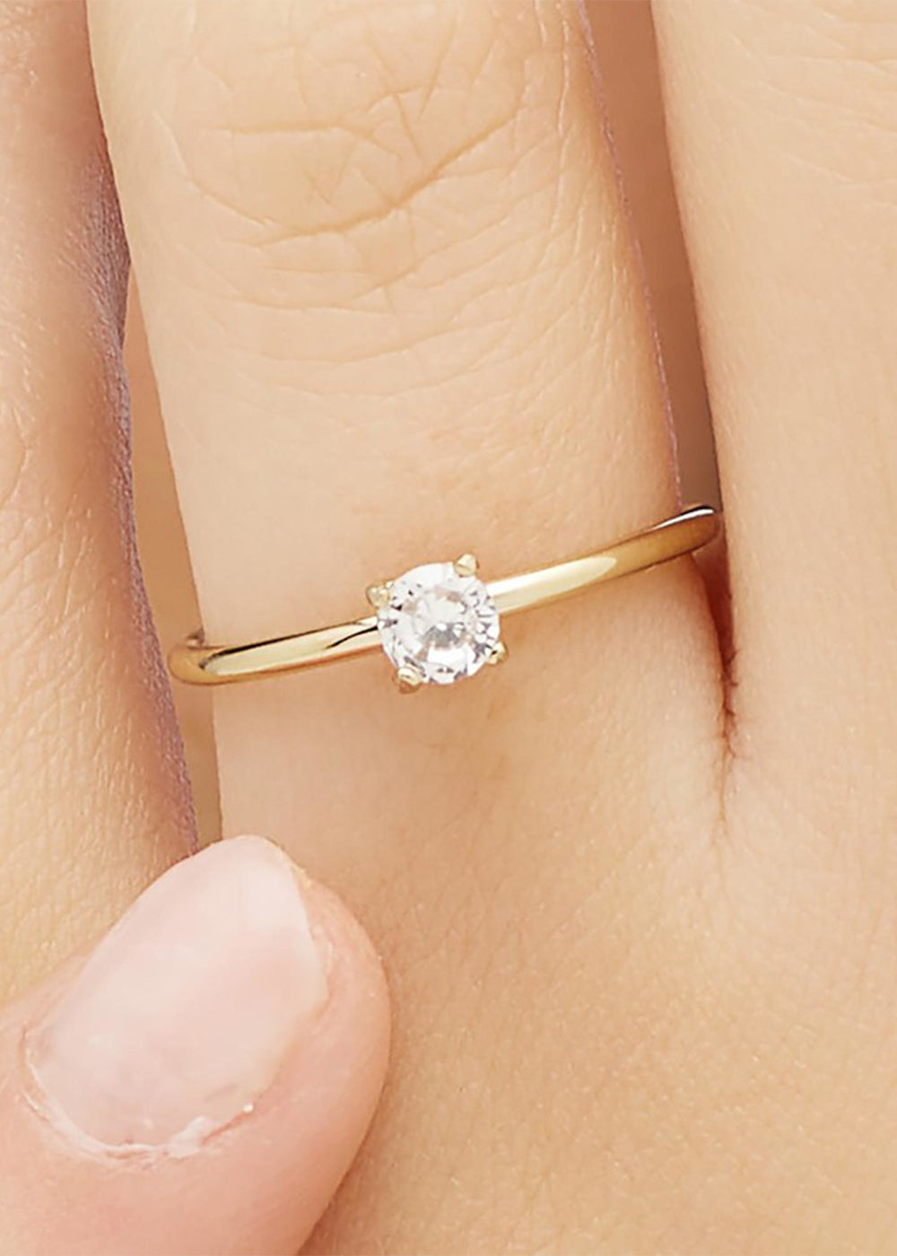 Anello regolabile Dazzly in acciaio color oro con finitura pvd oro 14K e pietra rosa