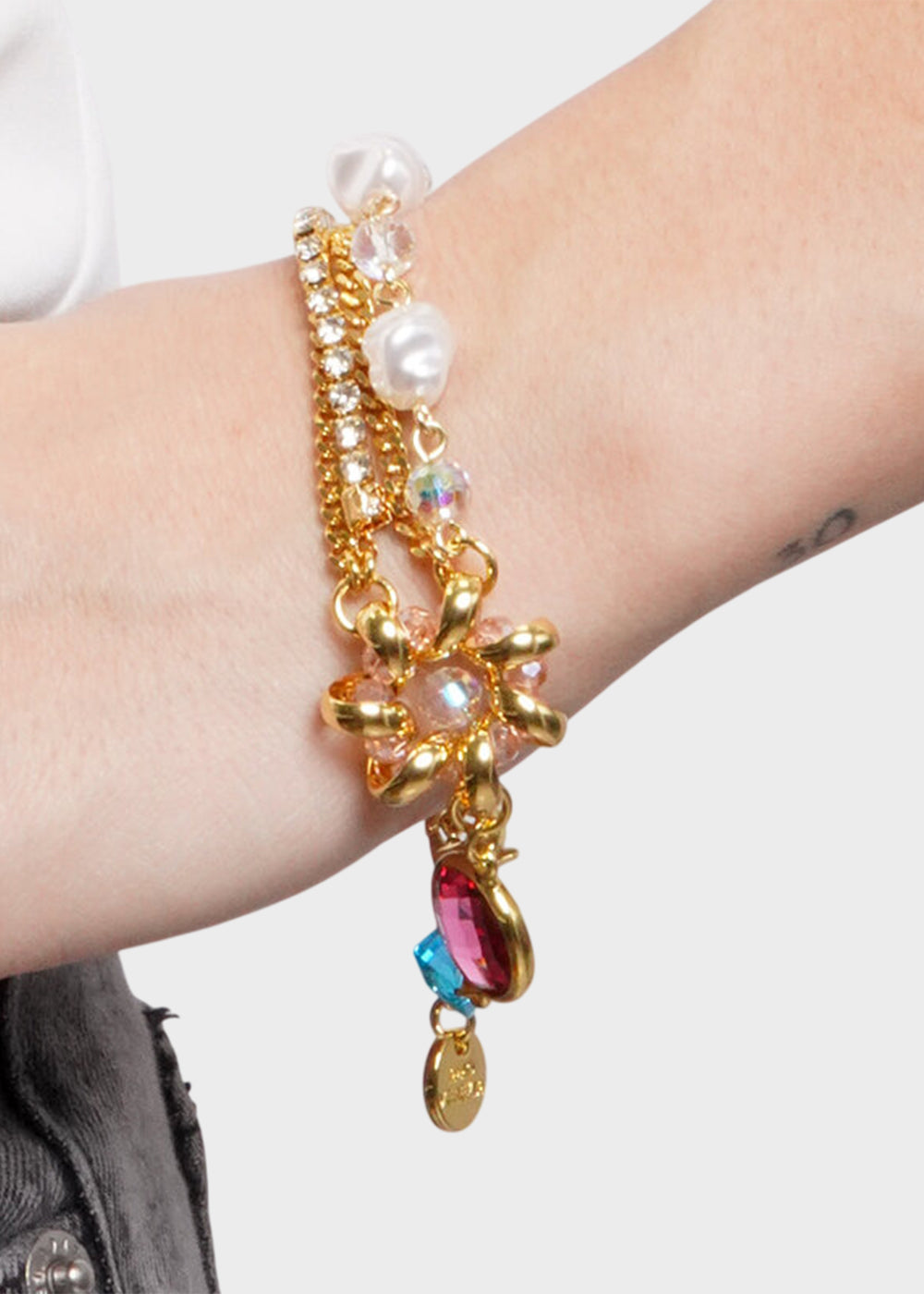 Bracciale multifilo in Metallo color oro con perle e pietre colorate
