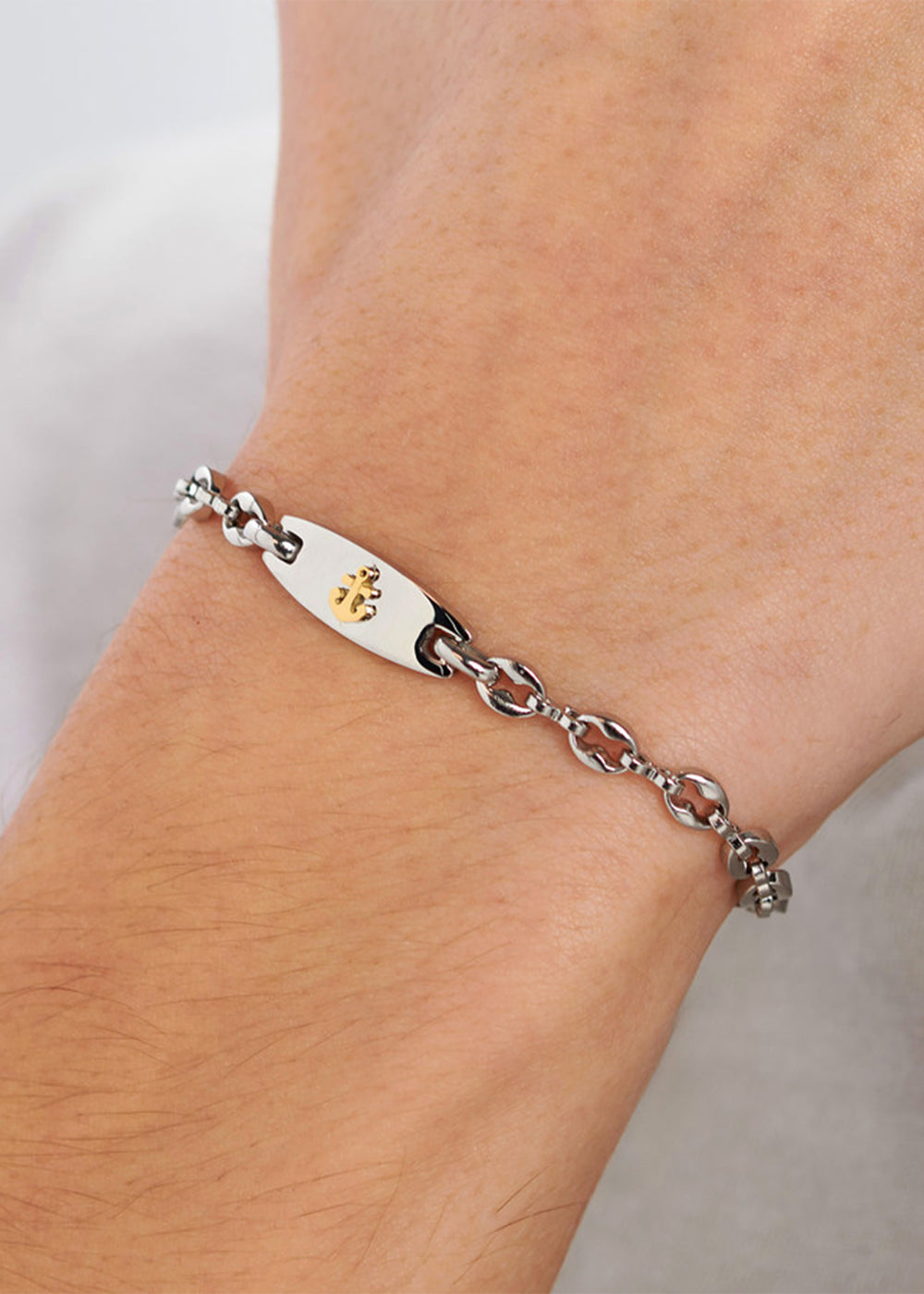 Bracciale catena Titan in acciaio con targa centrale con ancora e finitura pvd oro 14K
