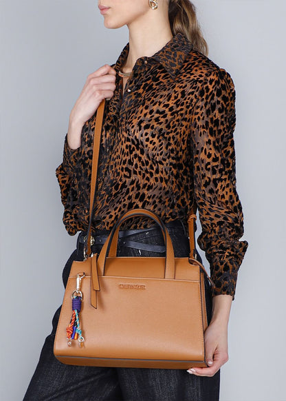 Shoulder bag with multicolored charms