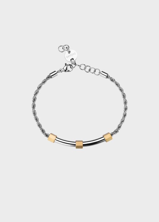 Bracciale Bound in acciaio con catena torchon, finitura pvd oro 14K e centrale con dettagli satinati