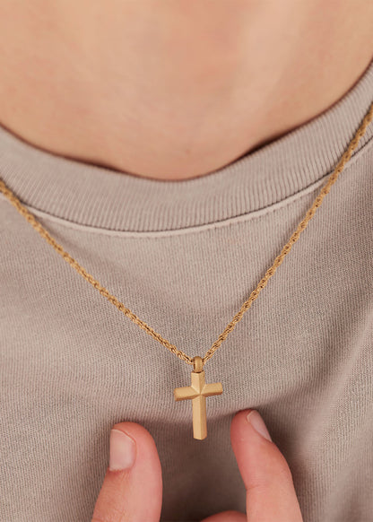 Collana Bound in acciaio con finitura pvd oro 14K e pendente a forma di croce