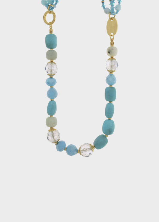 Collana lunga in Metallo color oro con pietre irregolari azzurre