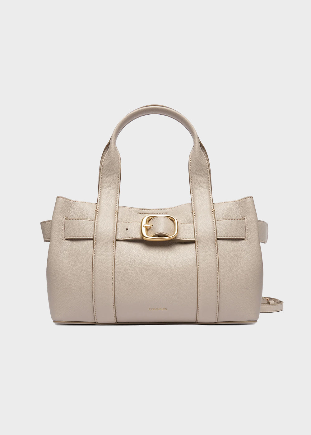 Handbag with shoulder strap and magnetic closure