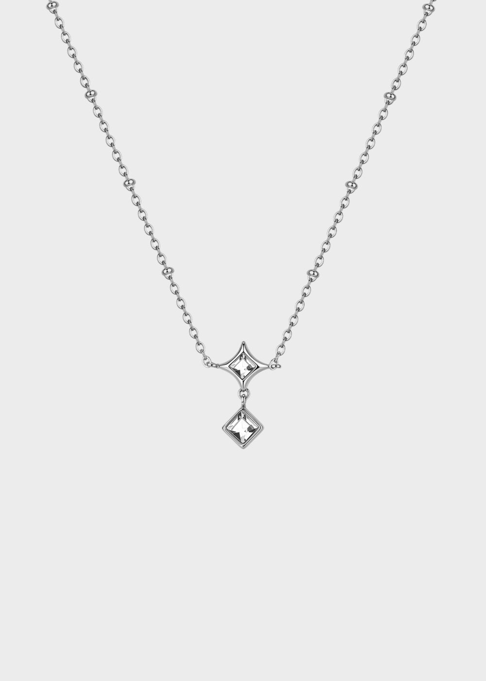 Collana Luce girocollo in acciaio con pietre pendenti