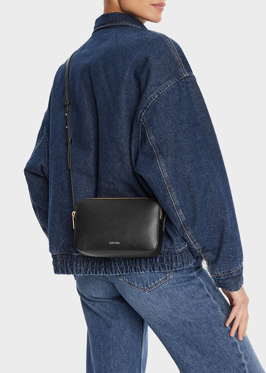 Shoulder bag with laminated logo