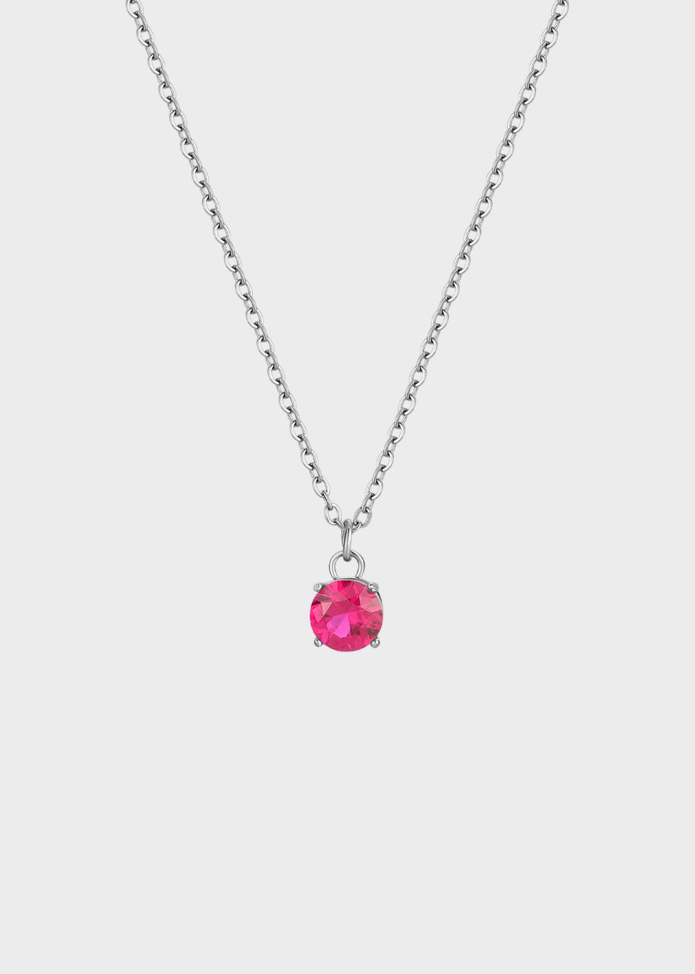 Collana Dazzly girocollo in acciaio e pendente centrale con pietra magenta