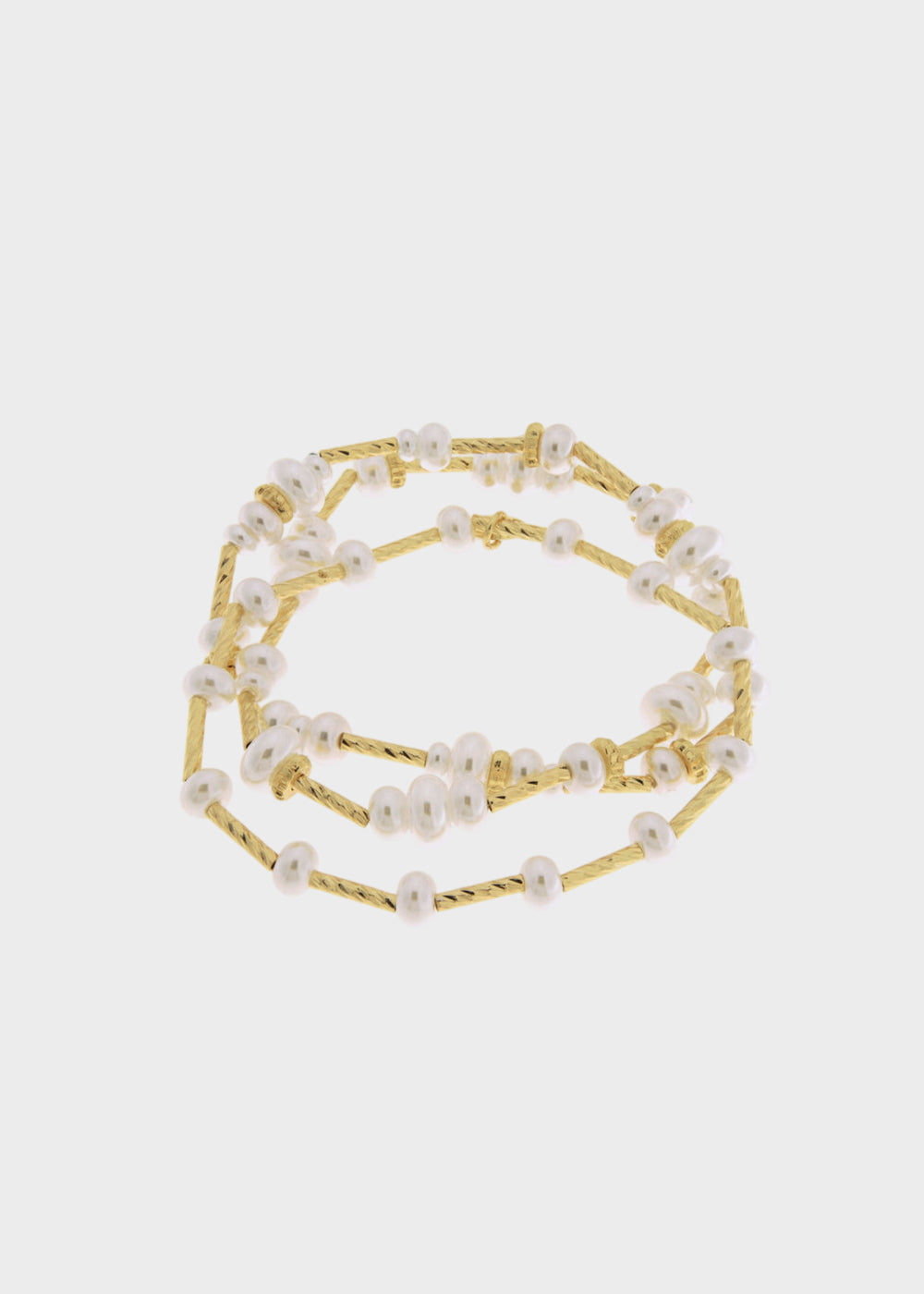 3 Bracciali elastici in Metallo color oro con perle