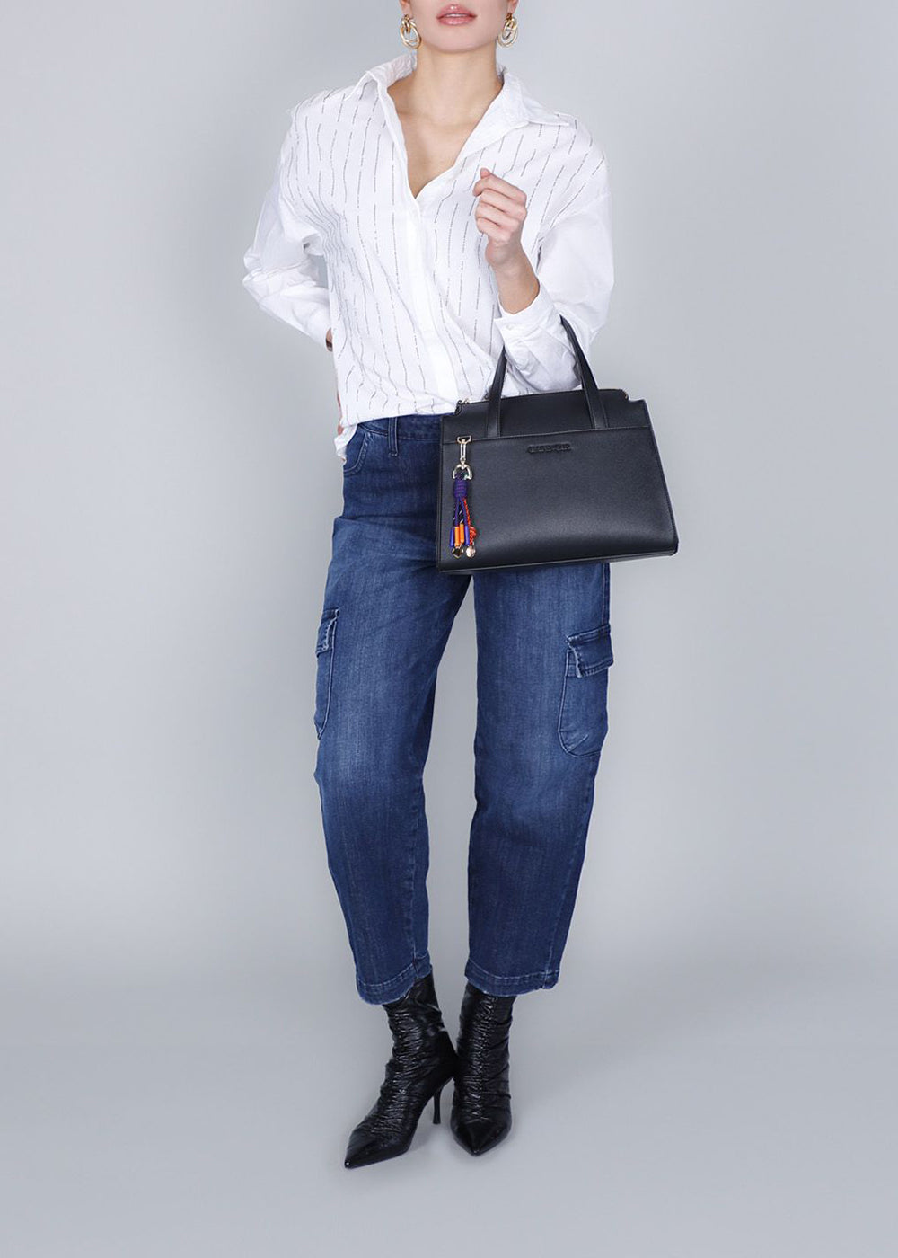 Shoulder bag with multicolored charms