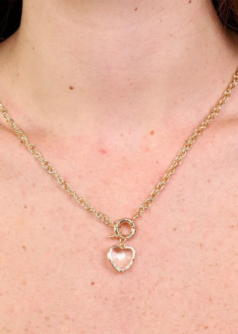 Collana in Metallo color oro con cuore bianco