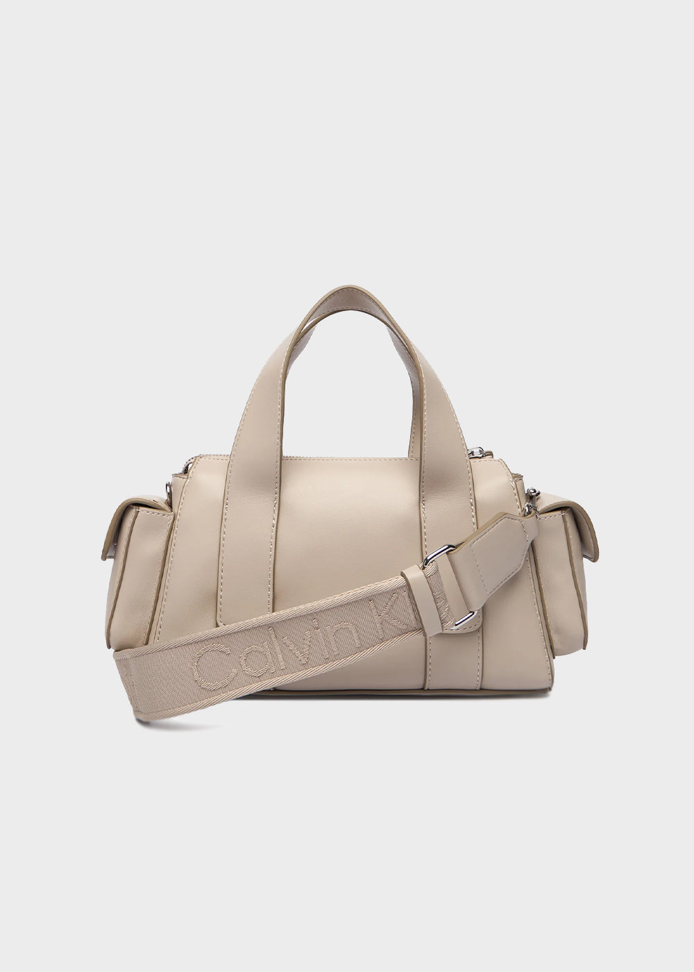 Handbag with shoulder strap and side pockets