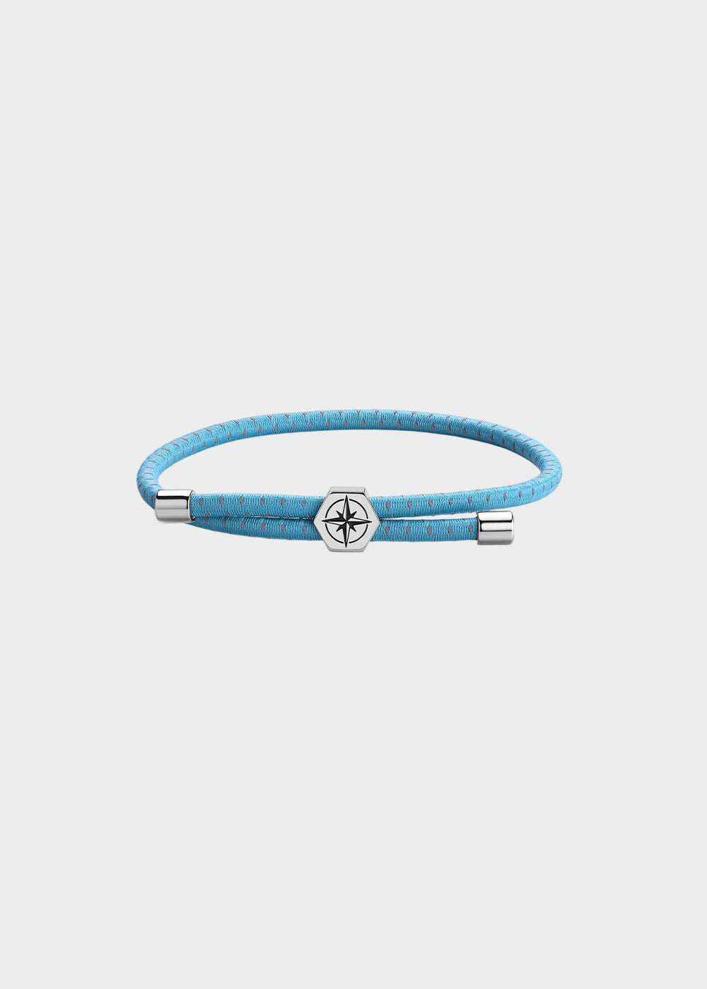 Bracciale Panama in cordino elastico azzurro con dettagli in acciaio e centrale con rosa dei venti