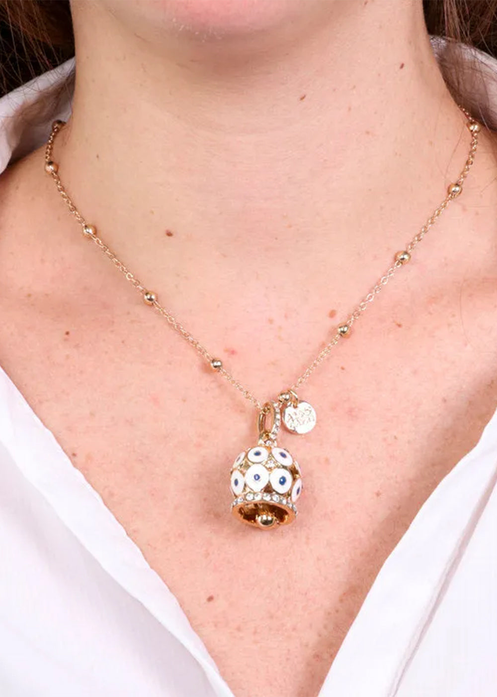 Collana in Metallo con campana a pois bianchi e zirconi grande