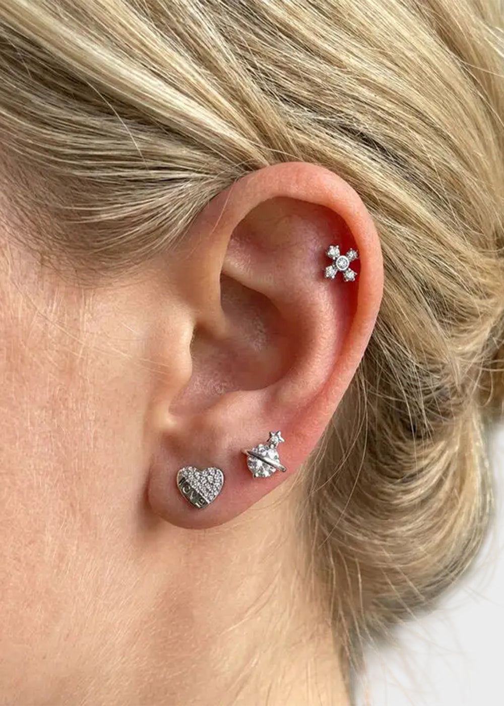 Orecchini in Metallo set da sei color argento croce, pianeta e cuore con cristalli