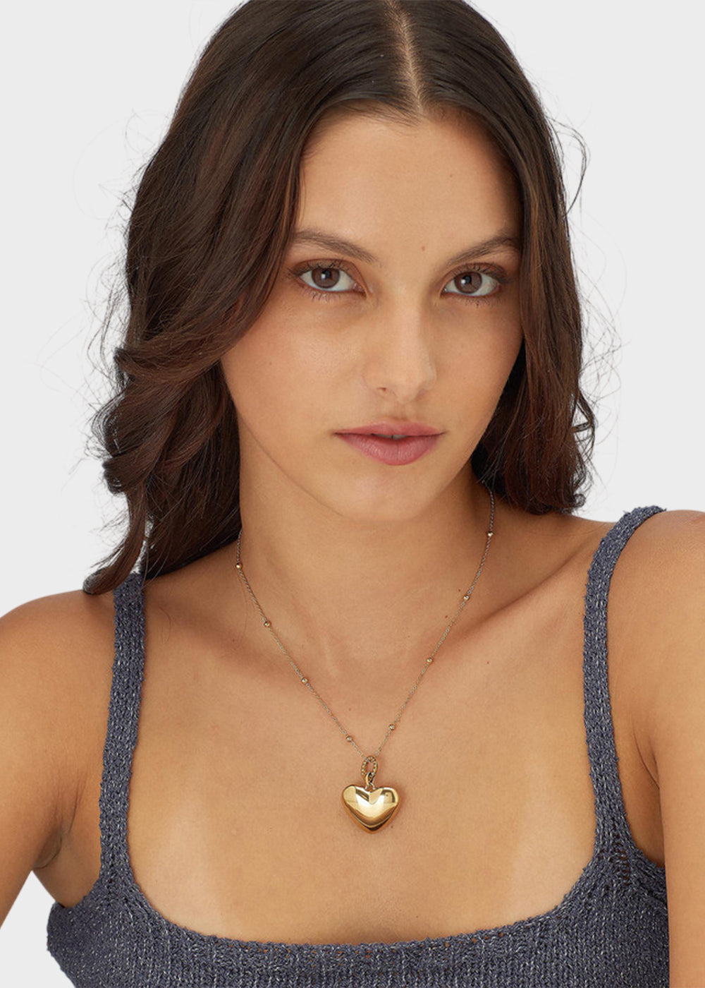 Collana Stellar in acciaio con finitura pvd oro 14K e pendente a forma di cuore