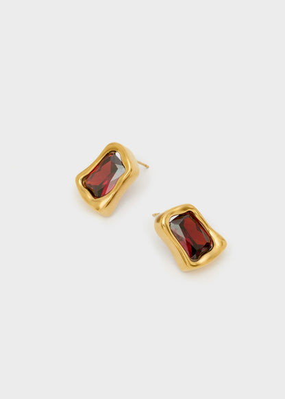 Orecchini Dalì a lobo con pietra rosso in acciaio