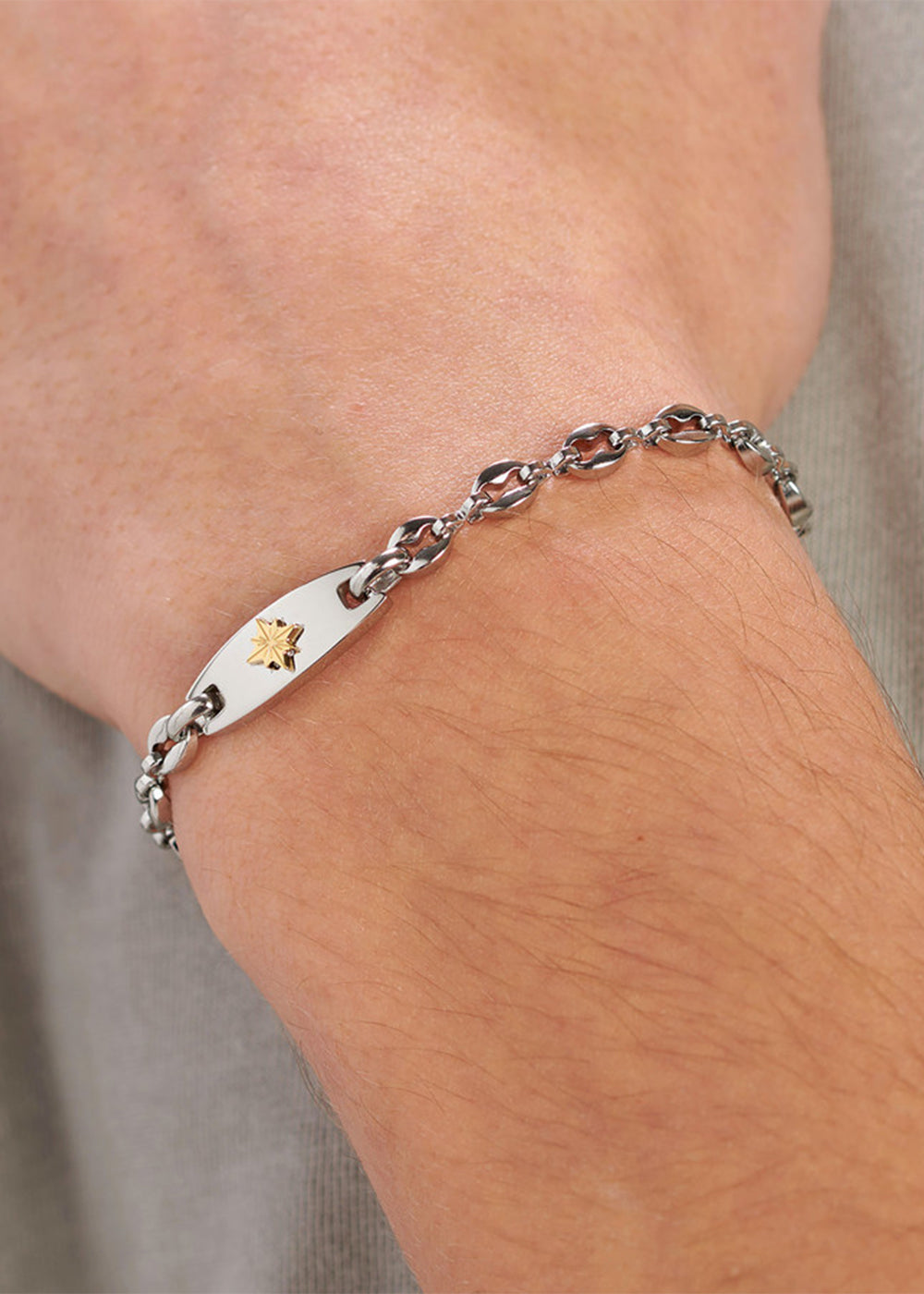 Bracciale catena Titan in acciaio con targa centrale con rosa dei venti e finitura pvd oro 14K